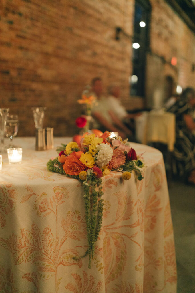 Sweetheart table design at Empire Mills wedding.