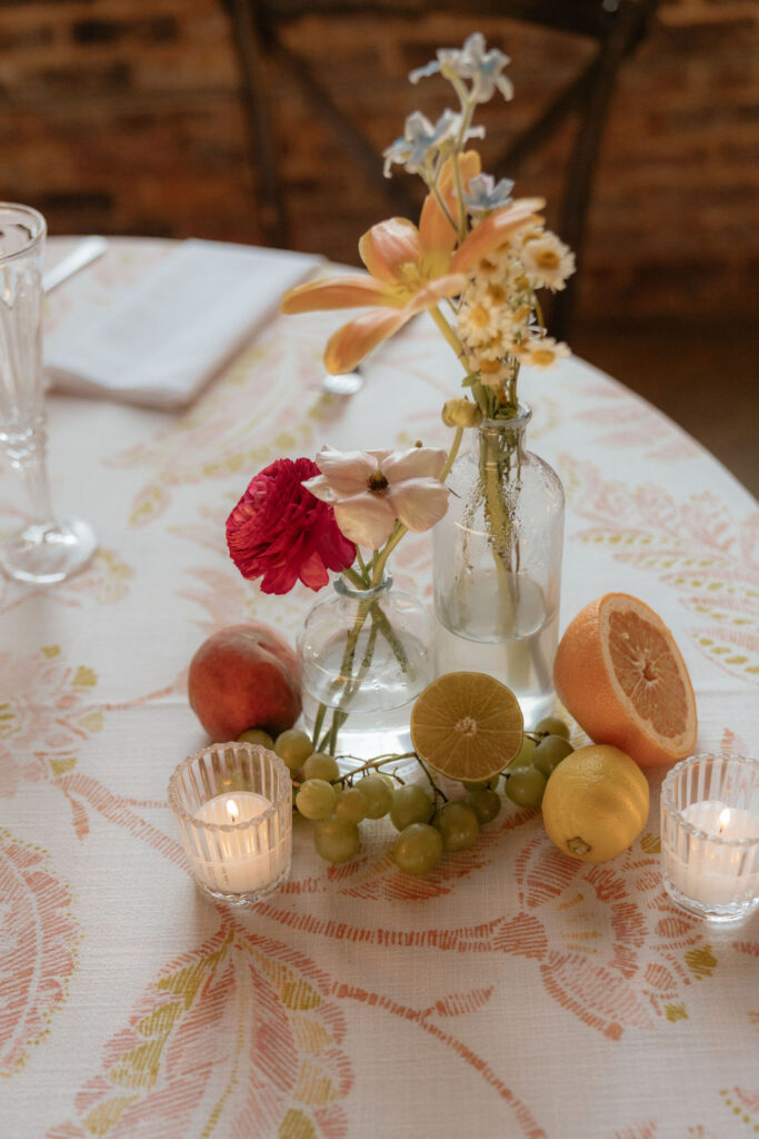 Floral centerpiece at Empire Mills wedding reception.